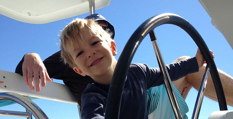Learning kids how to sail a yacht
